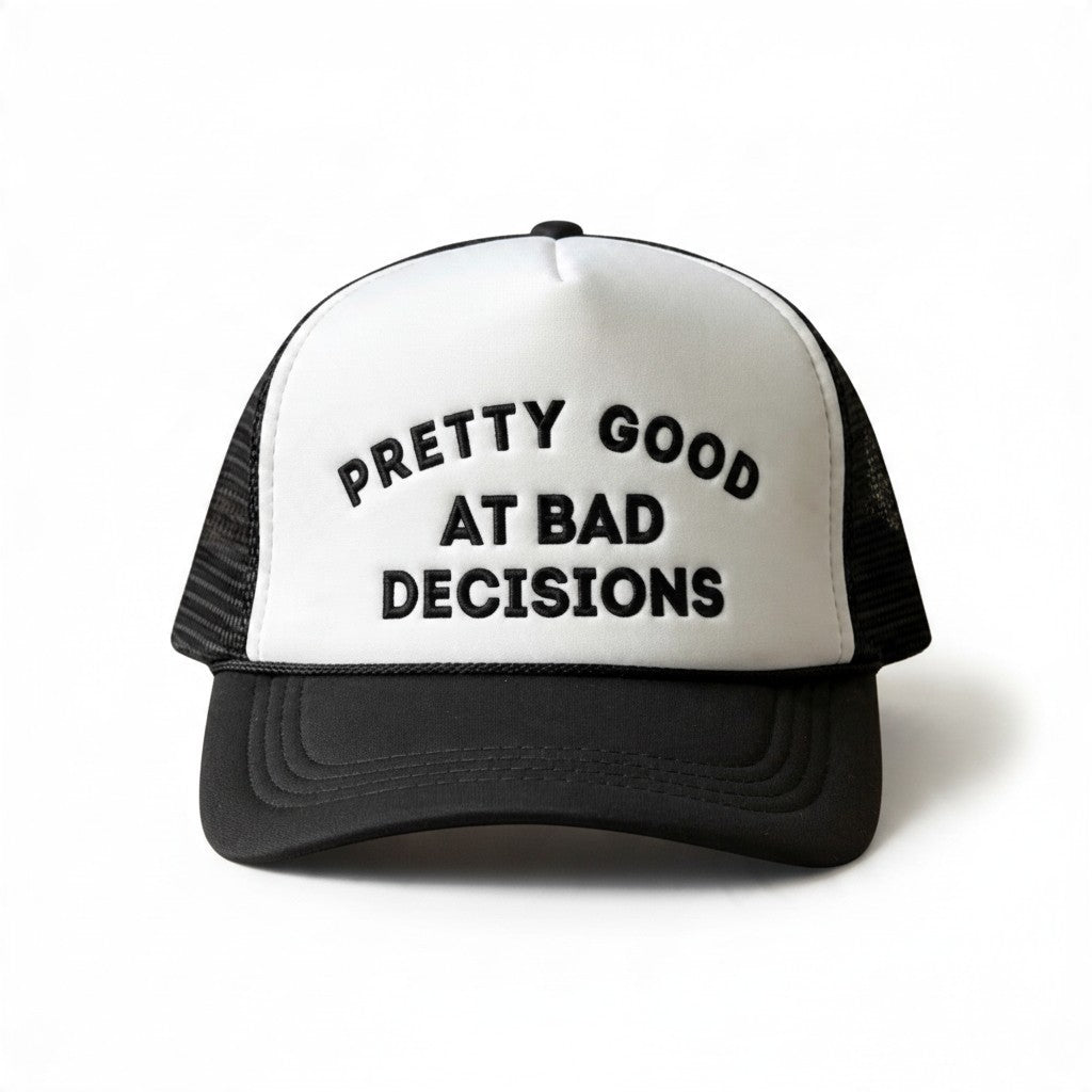 Dirty Merch Apparel black and white foam trucker hat with embroidered Pretty Good at Bad Decisions text