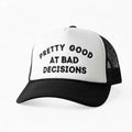 Dirty Merch Apparel foam trucker hat with white front, black brim, mesh back, and embroidered text on the front.