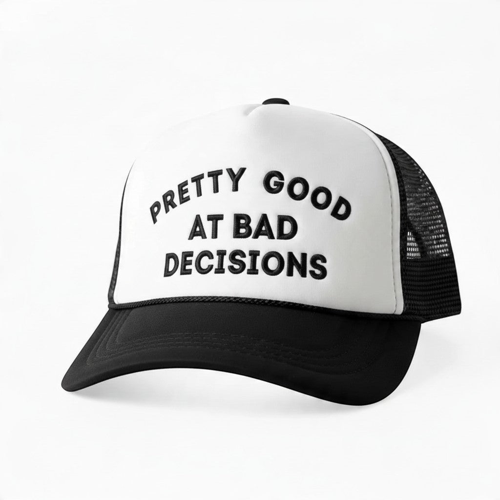 Dirty Merch Apparel foam trucker hat with white front, black brim, mesh back, and embroidered text on the front.