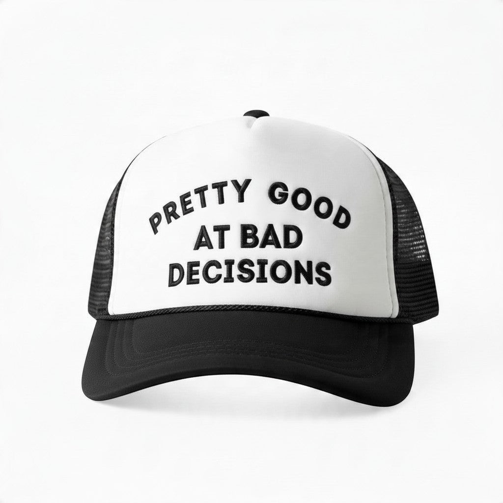 Dirty Merch Apparel white foam trucker hat with black brim, mesh back, and Pretty Good at Bad Decisions embroidery.