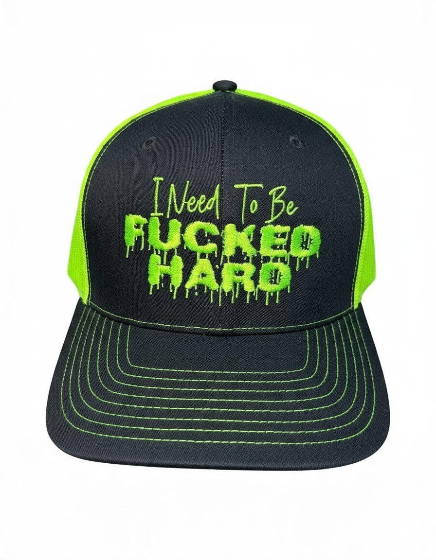 Dirty Merch Apparel charcoal and neon green trucker hat with graphic embroidery on the front panel
