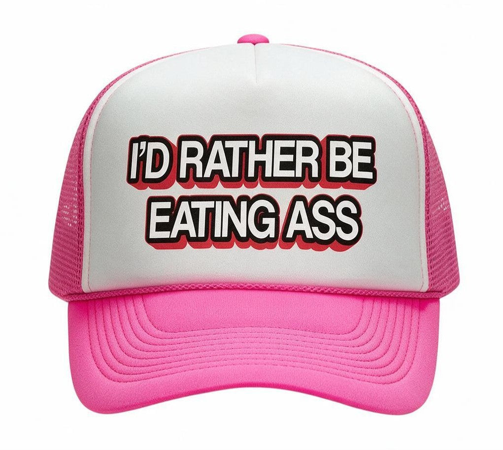 Dirty Merch Apparel Richardson 112 trucker hat in pink and white with embroidered text on the front panel.