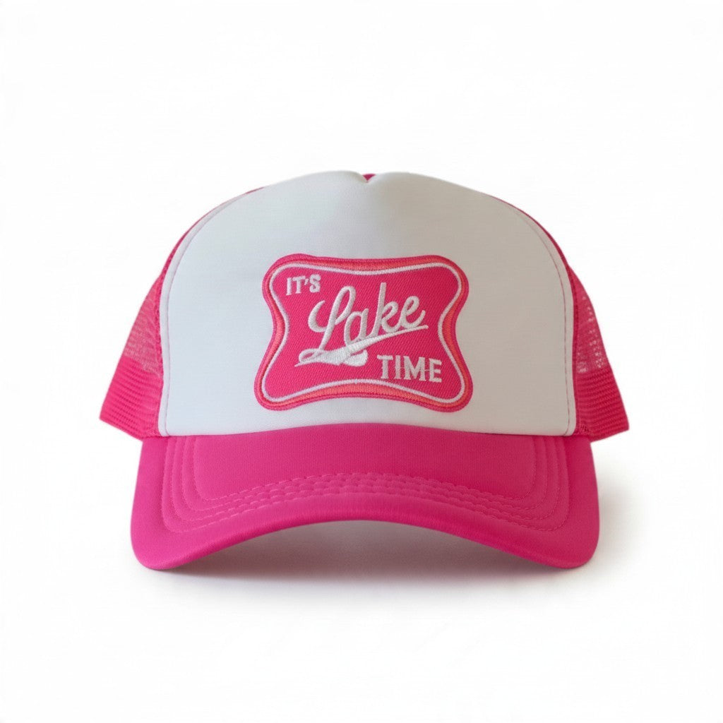 Dirty Merch Apparel pink and white trucker hat with embroidered It’s Lake Time logo on the front foam panel.