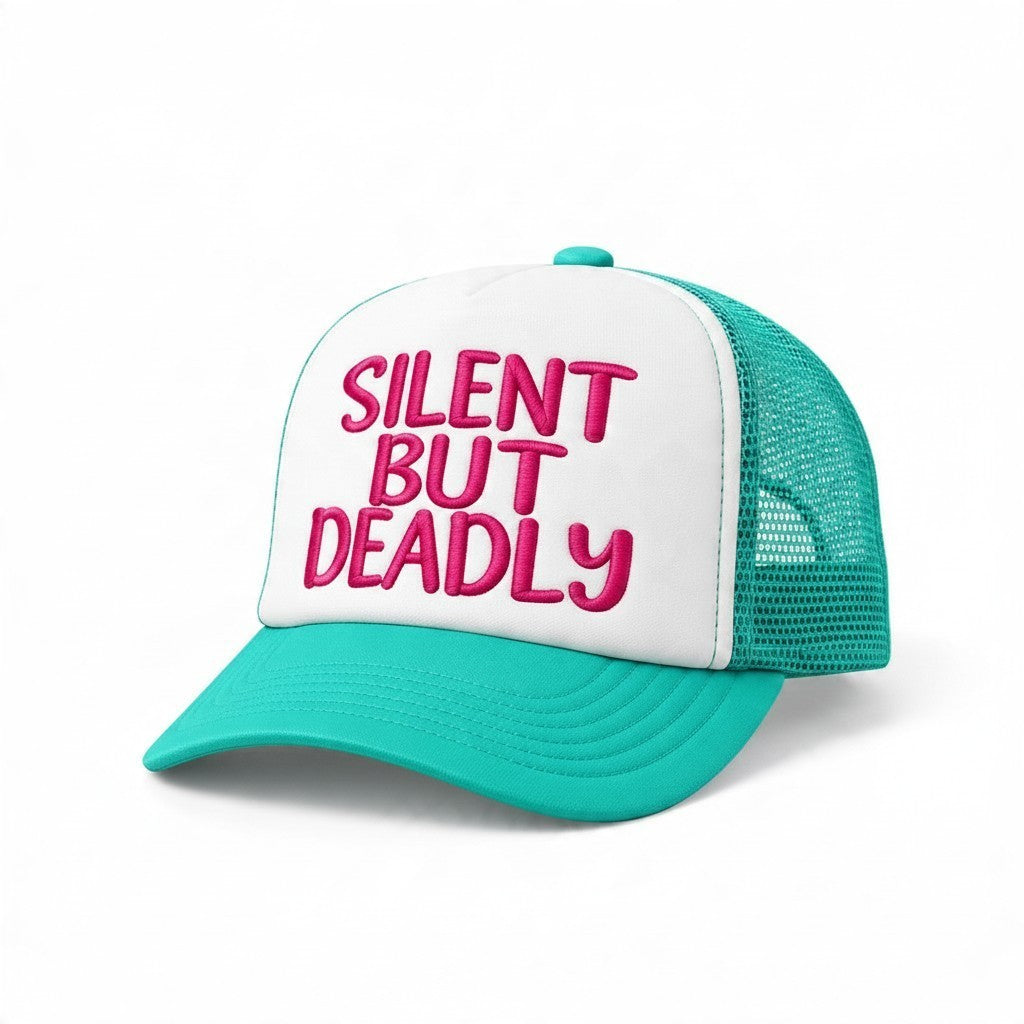 Dirty Merch Apparel trucker hat with white front panel, teal mesh back, and pink embroidered Silent But Deadly text.
