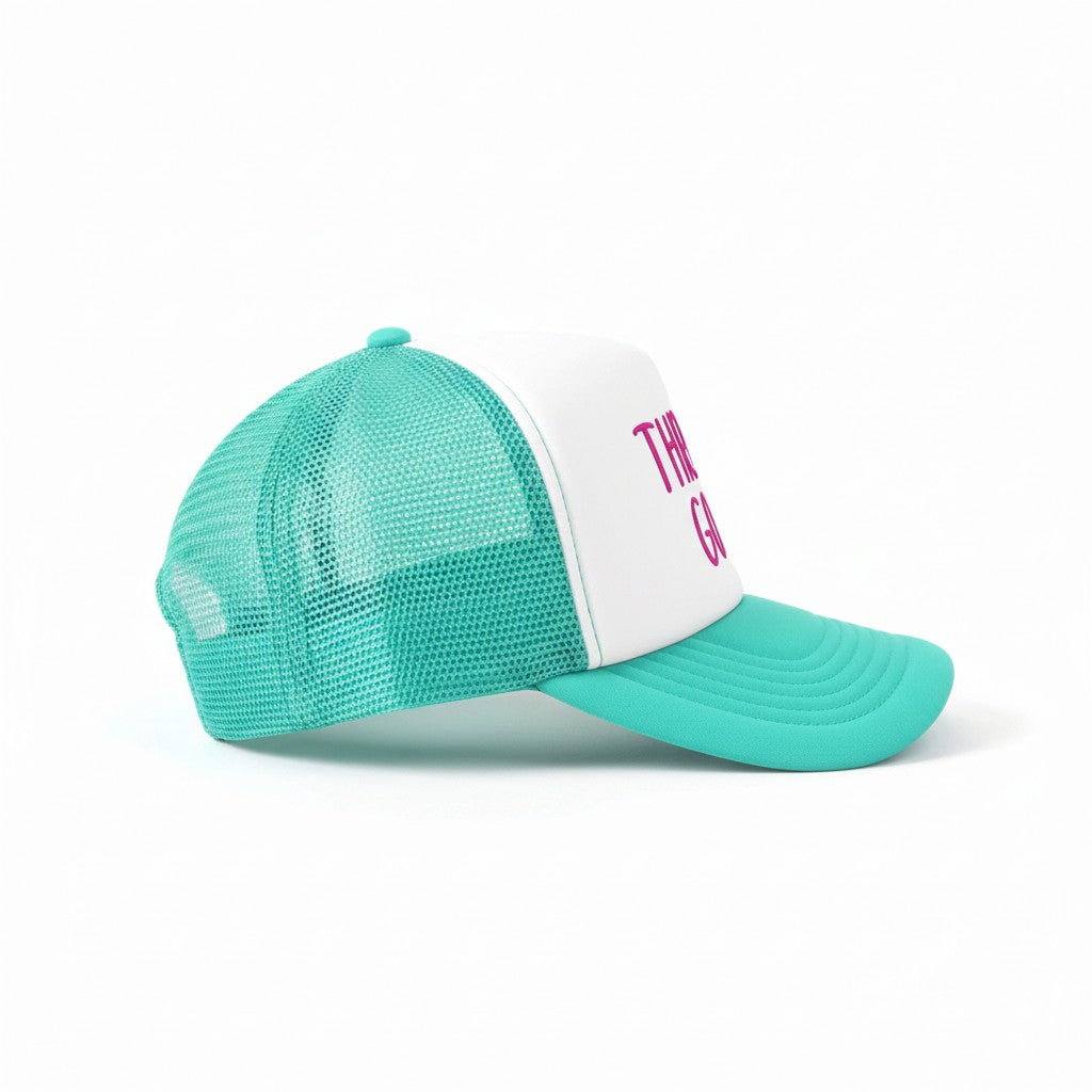 Dirty Merch Apparel Throat Goat trucker hat with white foam front, teal mesh back, and pink embroidered text.